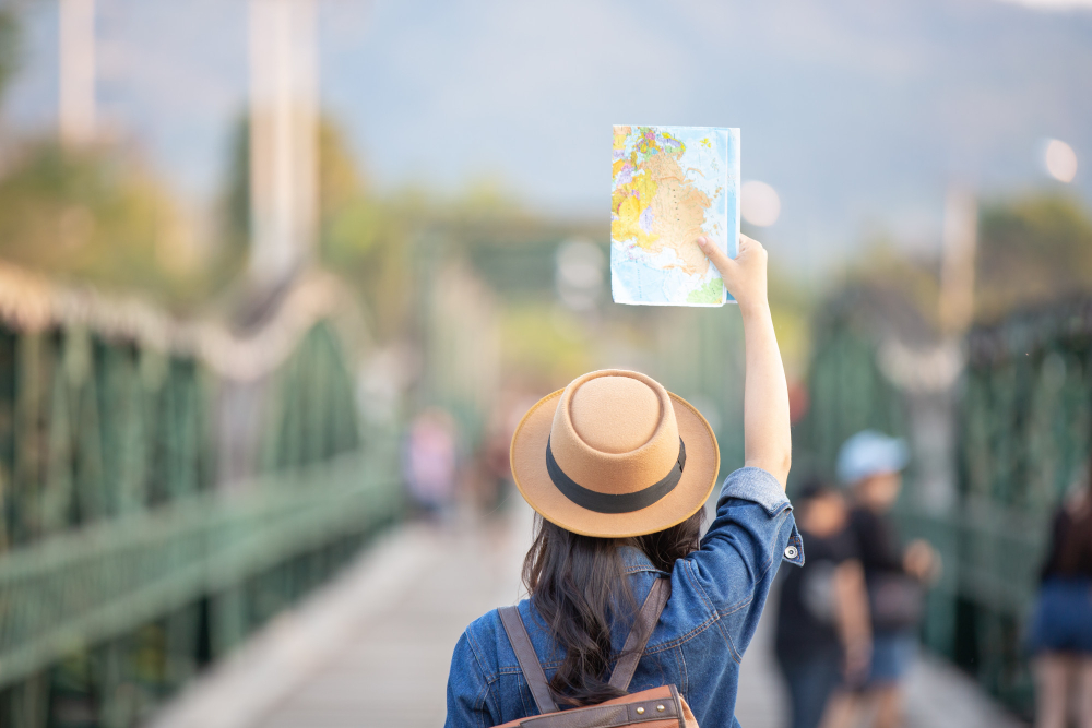 female-tourists-hand-have-happy-travel-map